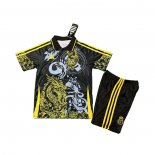Camiseta Real Madrid Dragon Nino 25-26 Negro Amarillo